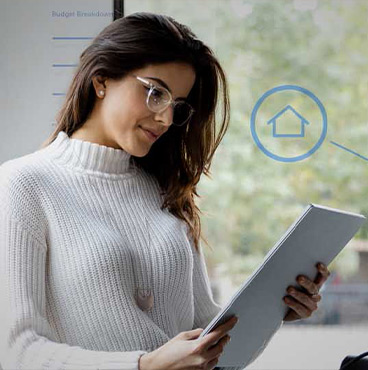 Woman looking at tablet with banking apps