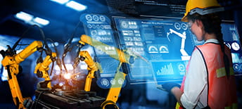 manufacturing employee working on machine screen