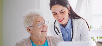 doctor and patient reviewing medical documents