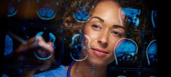 woman looking at medical imaging