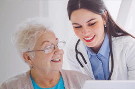 doctor and patient reviewing medical documents