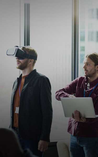 coworkers using virtual reality in meeting