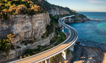 highway over water and side of cliff