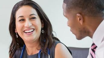 smiling female doctor with executive