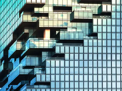 Angle view of modern building with a clear blue sky in background