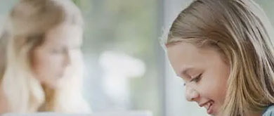 little girl with piggy bank