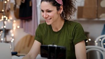 woman working from home on devices