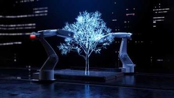 An outline of an electric tree being created by two robots