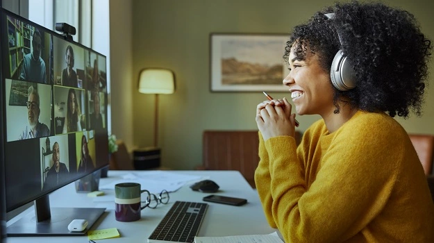 woman having virtual meeting at home