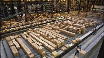 Overview of a large industrial distribution warehouse storing productsOverview of a large industrial distribution warehouse storing products
