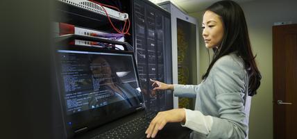 woman at computer server