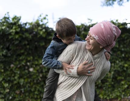 Child is playing with his mother