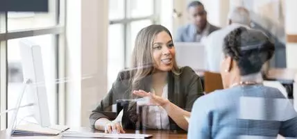 Employee is taking meeting with her team member