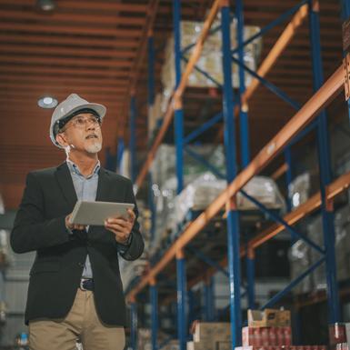 man in hardhat in warehouse