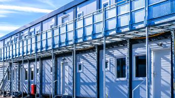 Blue beautiful houses in one column