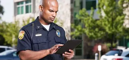 police officer using a tablet