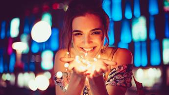 happy girl with sparklers