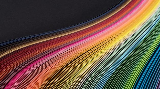 Rainbow Colored Paper Stripes Flowing Pattern