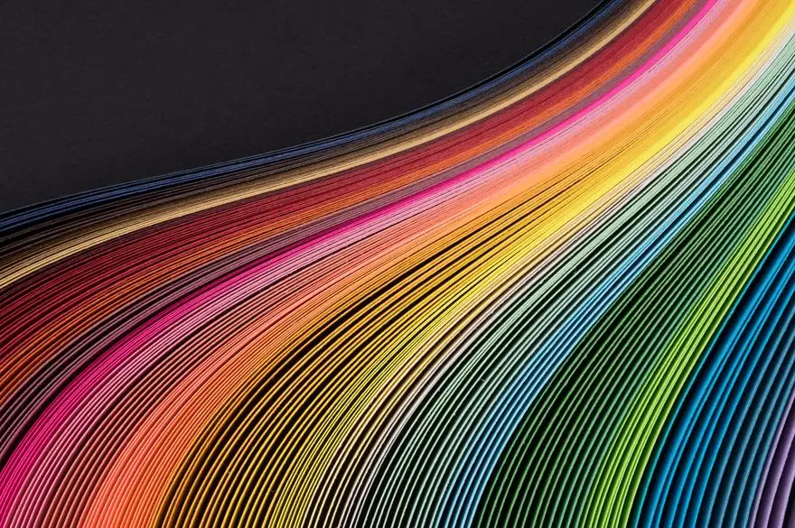 Rainbow Colored Paper Stripes Flowing Pattern