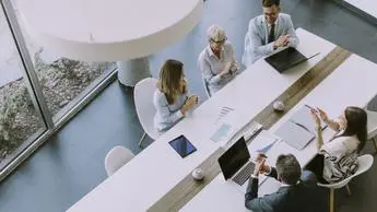 Employee having meeting related to project growth