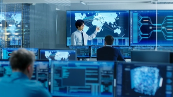 man pointing to map on screen