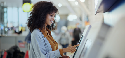 woman using a touchscreen device