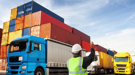 Container terminal with trucks with freight forwarding manager, worker