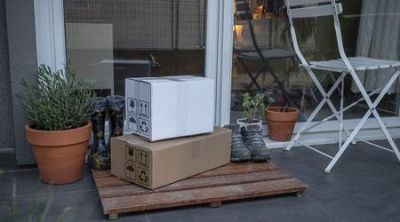 Cardboard package delivery at patio door