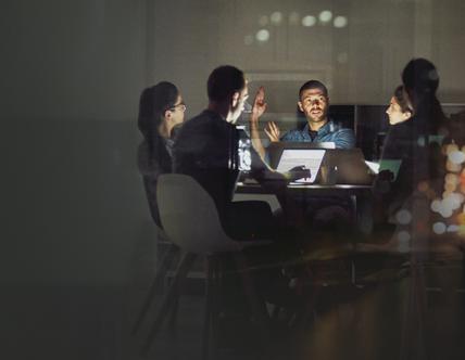 Shot of creative employees working late in the office