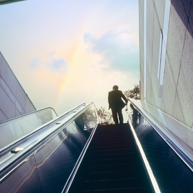 A Man is walking up the stairs